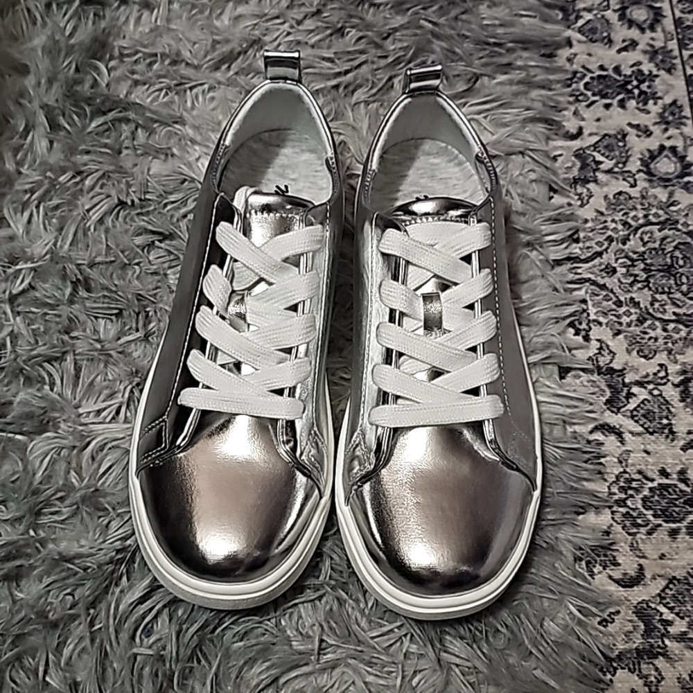 Silver tennis shoes